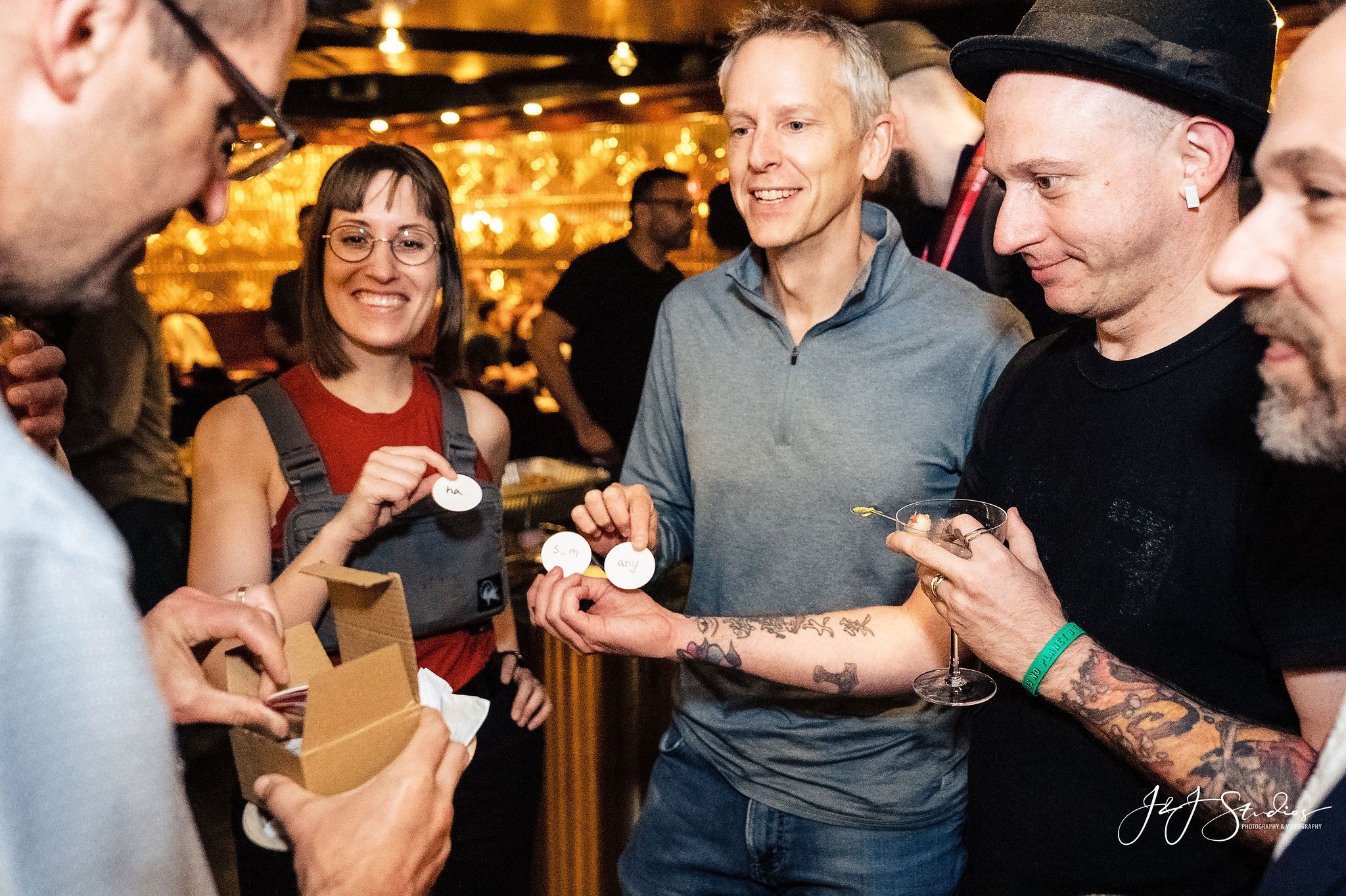 Guests solving riddles with thoughtbotters