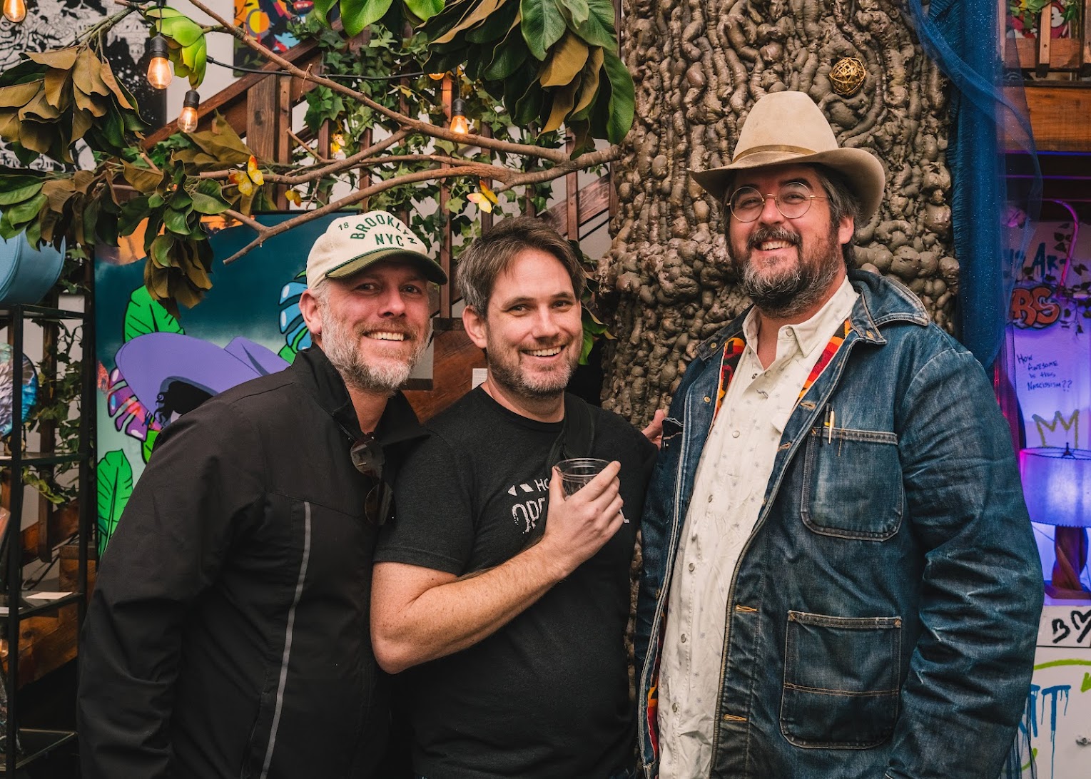 Three folks make new friends at the meetup