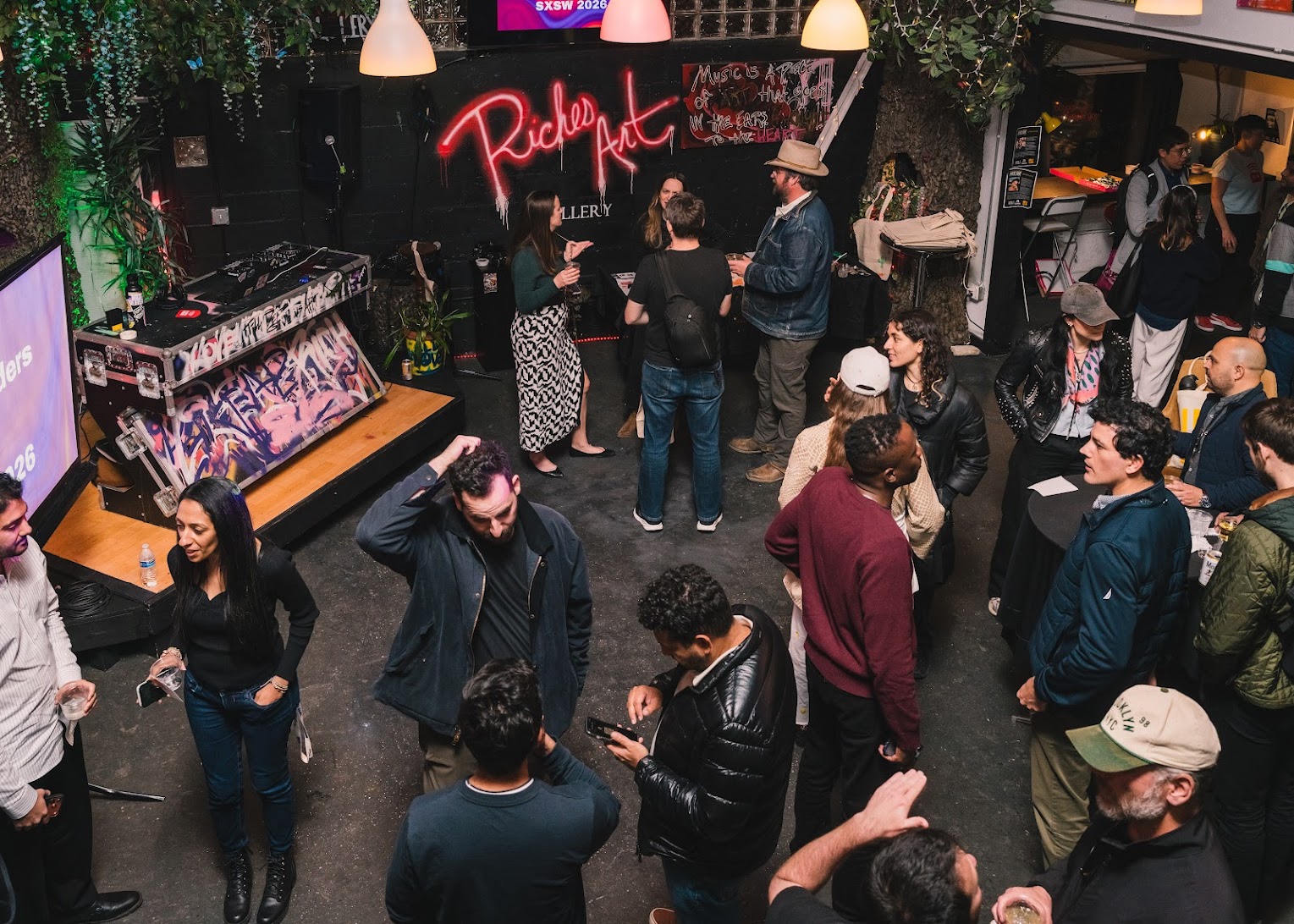 Tech Leaders, founders, creators, and investors mixing at thoughtbot's SXSW event